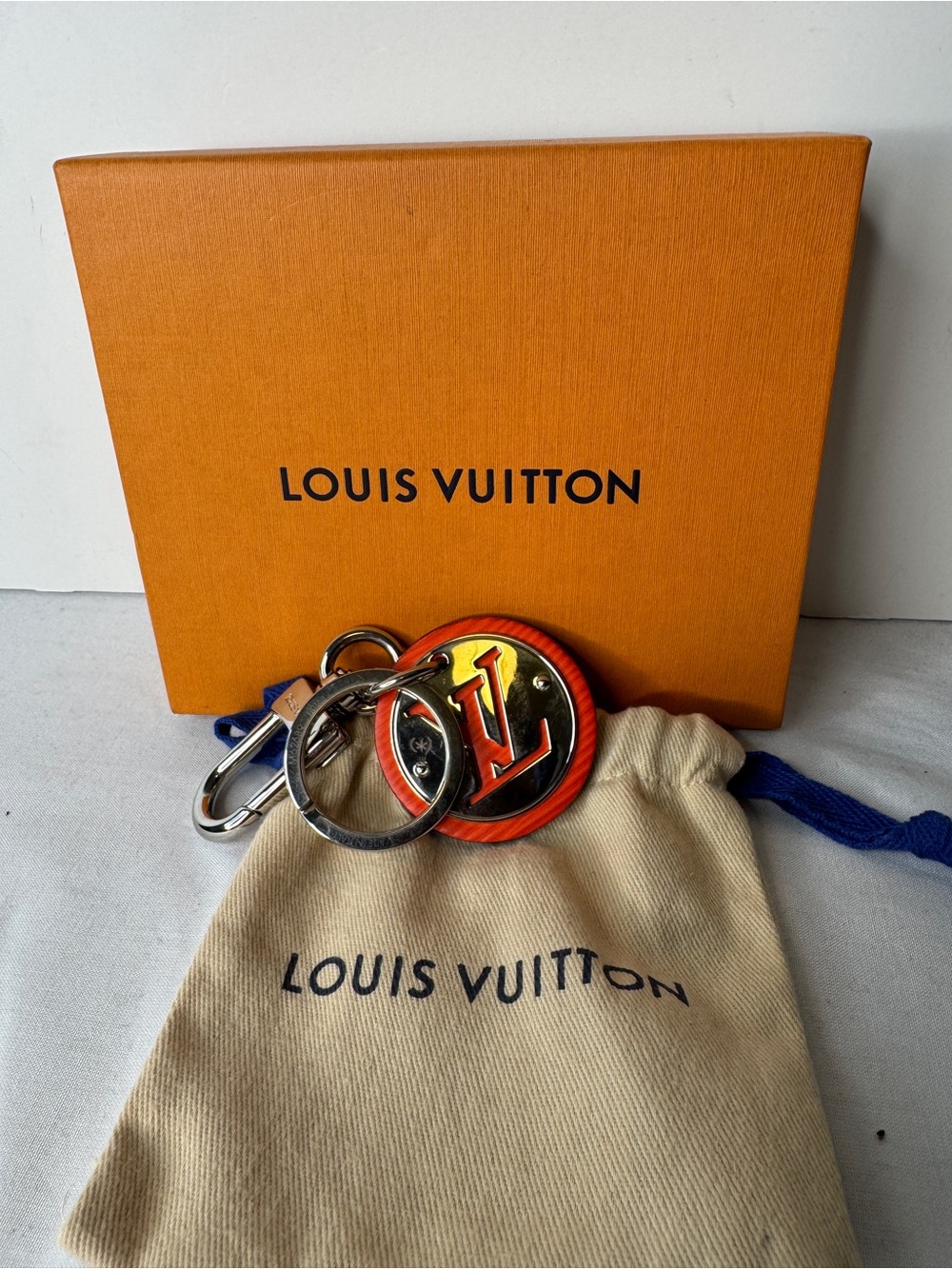 Louis Vuitton Orange & Gold Circular LV Key Charm